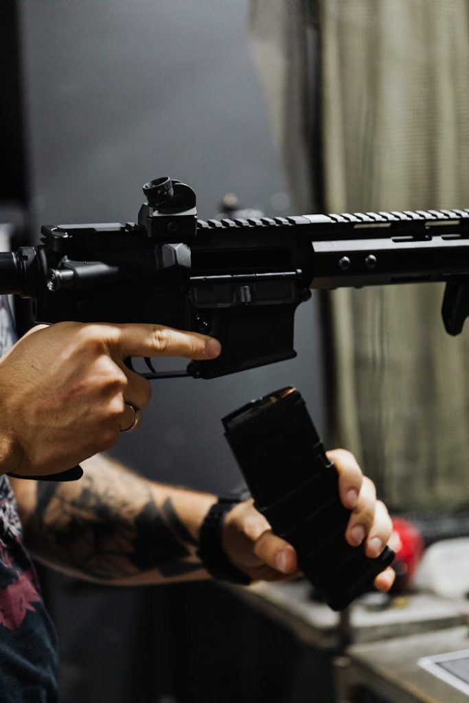 zipwp-image-5202403 A Person Reloading a Rifle